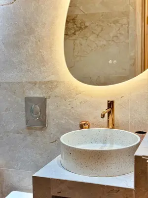 a bathroom with a sink and a mirror at Ermou 18 Central Cozy Apartment in Athens