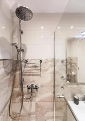 a shower with a glass door in a bathroom at Modern&Sunny, 1BD, next to metro in Athens