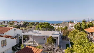 an aerial view of a white house at Chris Guesthouses in Anavissos