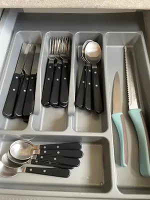 a tray filled with utensils in a drawer at Koukaki lovely stay in Athens