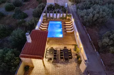 an overhead view of a house with a swimming pool at Villa Vegera in Anavissos