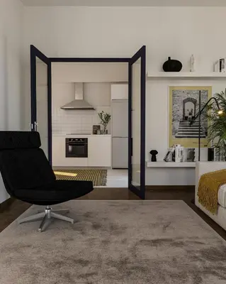 a bedroom with a mirror and a chair in a room at Historic Elegance in Acropolis in Athens