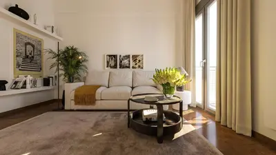 a living room with a couch and a table at Historic Elegance in Acropolis in Athens