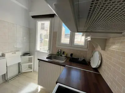 a kitchen with a sink and a counter top at The Katehaki Comfort Hub in Athens
