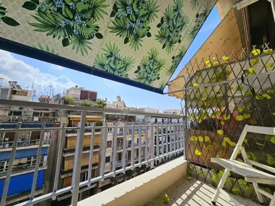 a balcony with a view of a building at EL Prestige Apartment - Athens Town in Athens