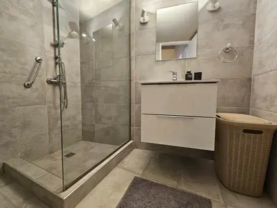 a bathroom with a shower and a sink at J&G Luxury Apartment - Athens Town in Athens