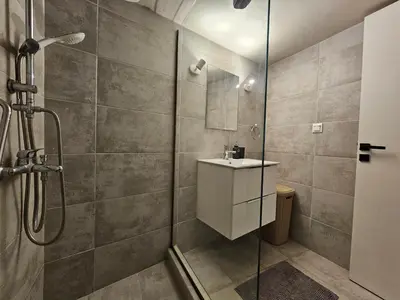 a bathroom with a shower and a sink at J&G Luxury Apartment - Athens Town in Athens