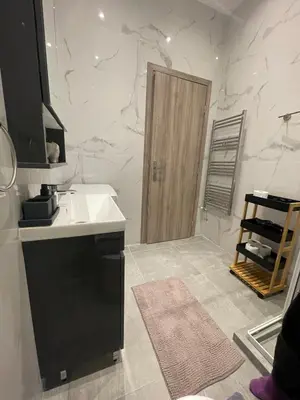 a bathroom with a sink and a counter top at Mimoza in Athens
