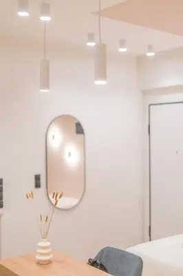 a mirror on a table in a room at Acropolis View Dream Penthouse in Athens