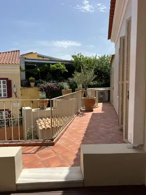 a balcony of a house with a fence at Acropolis View-Themelio Suite - Acropolis Area in Athens