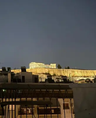 a view of the acropolis from the top of a building at Near Acropolis Sunny Apartment! in Athens