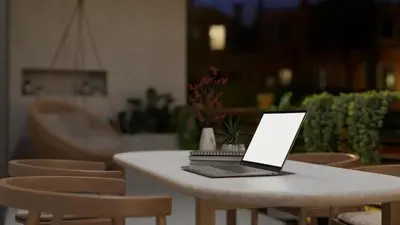 a laptop computer sitting on top of a table at The Acropolis Penthouse in Athens