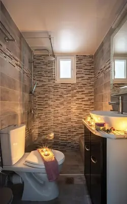 a bathroom with a toilet and a sink at Magic Moments Near The Acropolis in Athens