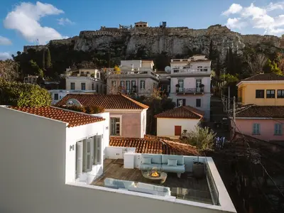 a view of the town from the roof of a house at Plaka Villa with Epic Acropolis Views in Athens