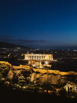 a view of the acropolis at night at Plaka Villa with Epic Acropolis Views in Athens
