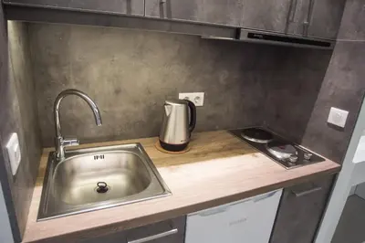 a kitchen counter with a sink and a blender at Millennial Apartments Athens in Athens