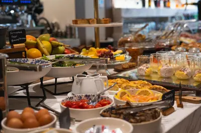 a buffet with a lot of food on a table at Eternity Athens in Athens