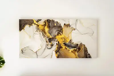 a painting of gold and white on a white wall at GK Agorakritou in Athens