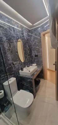 a bathroom with a toilet and a sink at New Luxury Studio, Near Hilton, Central , Ventiri Suite 7 in Athens