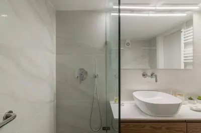 a bathroom with a shower with a sink and a shower at Perfect Spot! Studio in Kolonaki in Athens