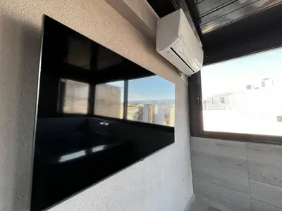 a bathroom with a large window and a sink at Private hottub Athens Skythens omonoia in Athens