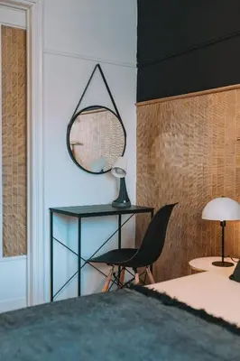 a bedroom with a desk and a chair and a mirror at 4BED apartment in the center of Athens in Athens