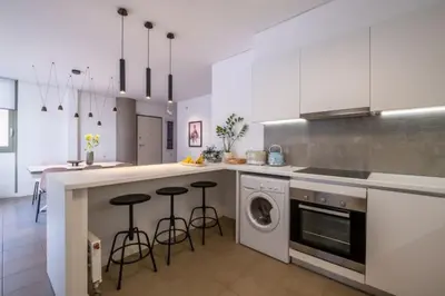 a kitchen with a sink and a dishwasher at Award-winning White-spot in Athens