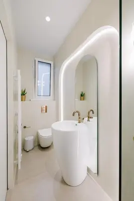 a white bathroom with a sink and a toilet at Y Residence in Athens