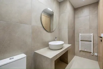 a bathroom with a sink and a mirror at M&H and their friends B in Athens
