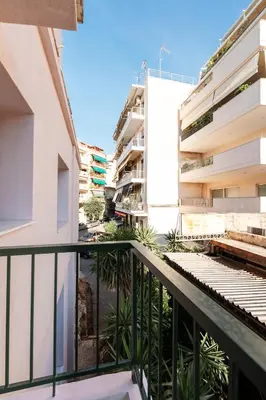 a balcony with a view of a building at The Verve by Zoia Living in Athens