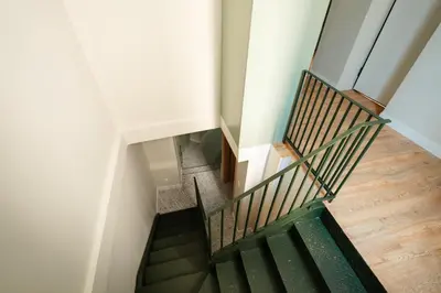 an overhead view of a staircase in a building at The Verve by Zoia Living in Athens