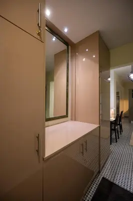 a dressing room with glass doors and a mirror at Mia Homes - Heart of Athens in Athens