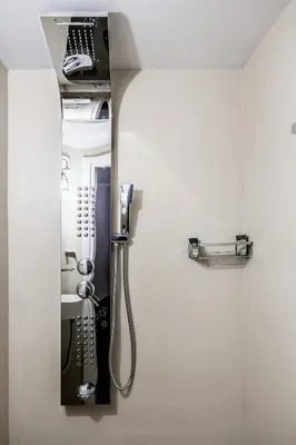 a bathroom with a sink with a shower at MZ Kolonaki Hills in Athens