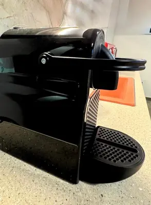a blackcomputer with a tie on a counter at Apartments Sunshine G1 in Athens