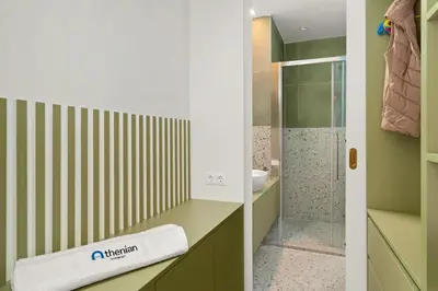 a bathroom with a sink and a shower at Athenian Harmony Parliament Square Athens Centre in Athens