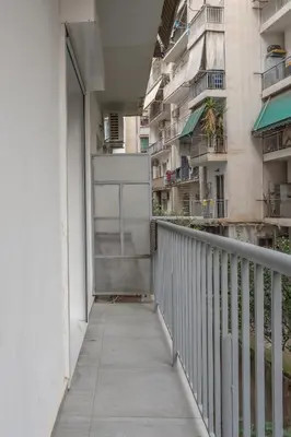 a walkway leading to a balcony of a building at The Suite by Spaceers in Athens