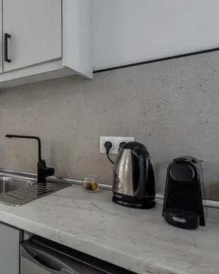 a toaster sitting on a counter in a kitchen at The Suite by Spaceers in Athens