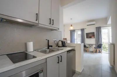 a kitchen with a sink and a counter top at The Suite by Spaceers in Athens