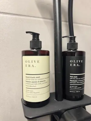 two bottles of antirella on a shelf at Reservoir Athens in Athens