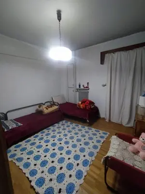 a living room with a large rug on the floor at أثينا in Athens