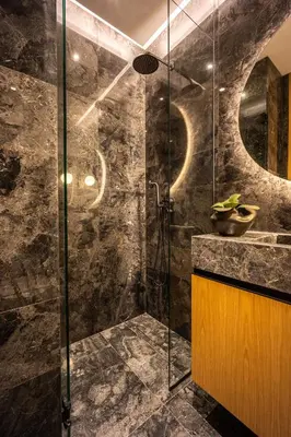 a bathroom with a shower with a glass door at The Athenian Luxury Penthouse by GK Properties in Athens