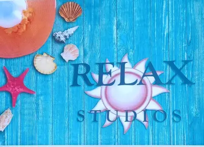 a sign that says new ships with a pink fish and shells at relax studio appartment in Porto Rafti