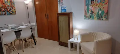 a dining room with a table and a chair at Vintage Apartment Athens Center 6BD-2BATH in Athens