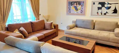 a living room with two couches and a coffee table at Marvelous apartment in Plaka in Athens