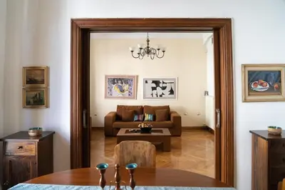 a living room with a couch and a table at Marvelous apartment in Plaka in Athens