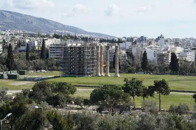 a view of a city with buildings and trees at Marvelous apartment in Plaka in Athens