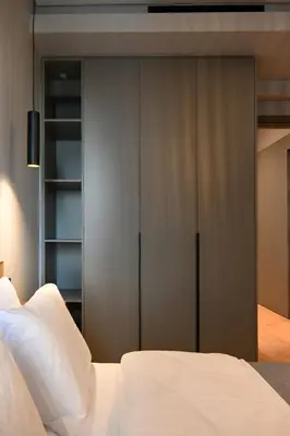 a bedroom with a bed and a closet at New 2BR apt in Kallithea in Athens