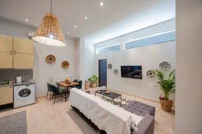 a living room with a couch and a table at K8 Syntagma in Athens