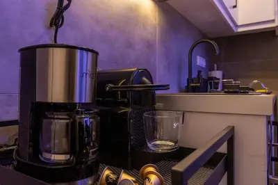 a coffee maker sitting on a counter in a kitchen at Athens Center Retreat in Athens