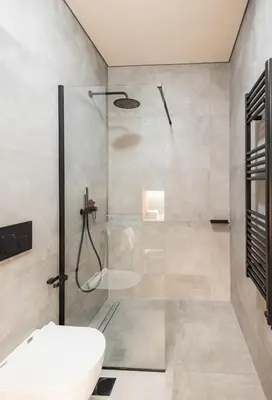 a bathroom with a shower with a toilet and a sink at Mandarin One Bedroom Apartment Varkiza in Vari